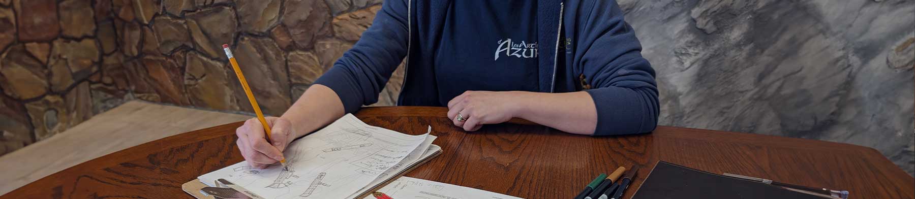 banner with a person drawing a LARP costume sketch to present ur appointment custom service