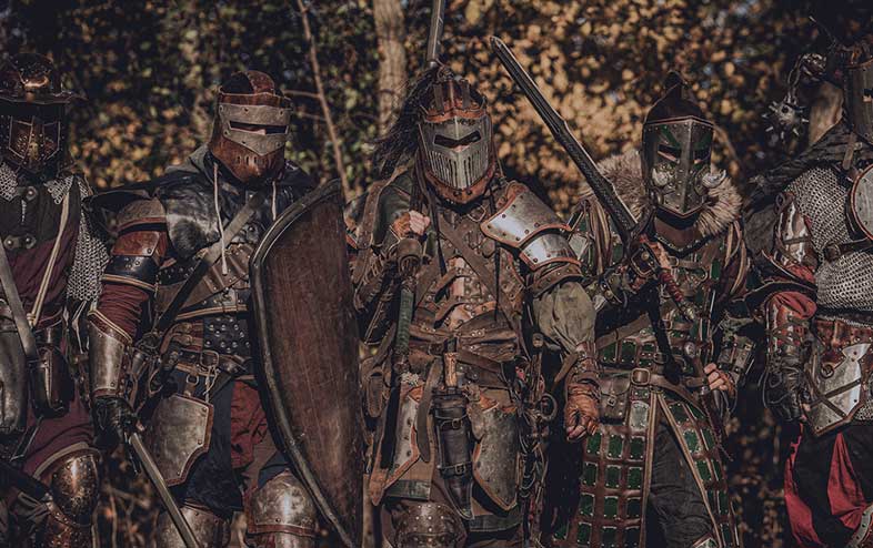 5 heroes walking in full leather custom armors for LARP