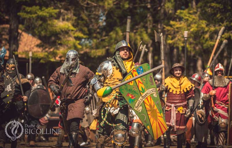 Charging warriors in a campaign at Bicolline the biggest Larp in Canada